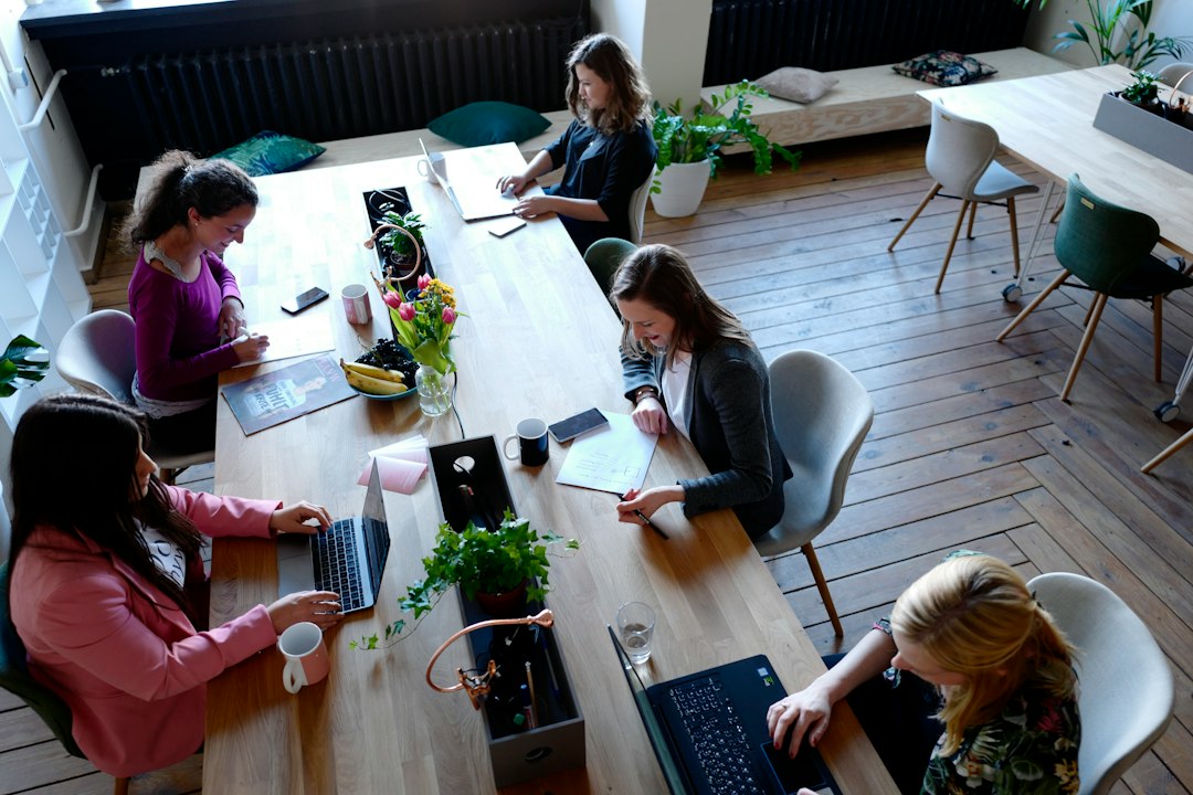 Office collaboration illustrating Gemini coworker agents and enterprise AI workflows